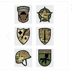 May include: A set of eight military patches, including a helmet, a star, a shield with a lightning bolt, a shield with a target, and a shield with a claw. The patches are all in camouflage colours.