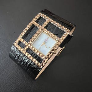 Fine Erickson Beamon Ladies Gold Tone Stone Set Watch