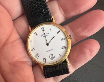 Vintage men’s / unisex Rotary Gold Tone Date Quartz Watch