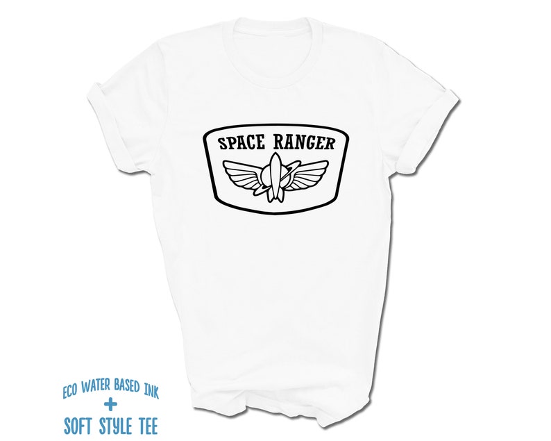 May include: White t-shirt with a black graphic of a space ranger patch. The patch has a rocket ship with wings and the text "SPACE RANGER".