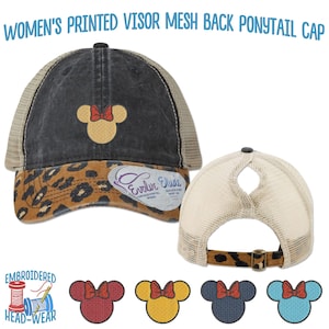 May include: A black and brown baseball cap with a mesh back and a ponytail hole. The front of the cap features a leopard print design and an embroidered image of Mickey Mouse with a red bow. The text "Evolve Divine" is printed on the side of the cap. The cap is available in four different colors: red, yellow, blue, and turquoise.