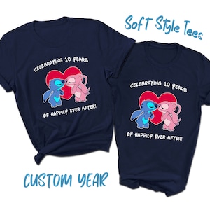 May include: Two navy blue t-shirts with a graphic of Stitch and Angel from Lilo & Stitch kissing. The text on the shirts reads "Celebrating 10 Years of Happily Ever After!"