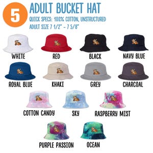 May include: A selection of 12 adult bucket hats in various colors, including white, red, black, navy blue, royal blue, khaki, grey, charcoal, cotton candy, sky, raspberry mist, purple passion, and ocean. Each hat features a small embroidered design of a cartoon animal.