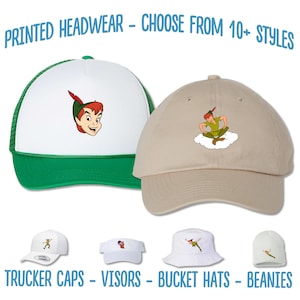 May include: Four different styles of hats featuring a cartoon image of Peter Pan. The hats include a white and green trucker cap, a beige baseball cap, a white bucket hat, and a white beanie.