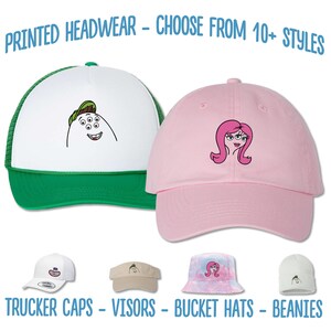 May include: A selection of printed headwear, including trucker caps, visors, bucket hats, and beanies. The headwear features various cartoon characters and designs. "PRINTED HEADWEAR - CHOOSE FROM 10+ STYLES" and "TRUCKER CAPS - VISORS - BUCKET HATS - BEANIES" are written in blue text at the top and bottom of the image.