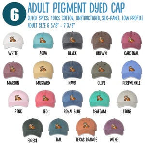 May include: A chart showing 18 different color pigment dyed baseball caps with a cartoon tiger embroidered on the front. The caps are unstructured, six-panel, and low profile. The adult size is 6 5/8" to 7 3/8".
