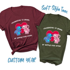 May include: Two maroon and olive green t-shirts with a graphic of two cartoon characters kissing inside a heart. The text on the shirts reads "Celebrating 10 years of happily ever after!"