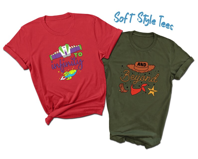 May include: Two short-sleeved t-shirts. One is red with a graphic of a spaceship and the words "to infinity". The other is olive green with a cowboy hat graphic and the words "and beyond". The text "Soft Style Tees" is also visible.