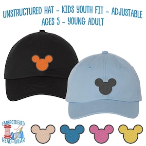 May include: Two unstructured adjustable hats with embroidered Mickey Mouse ears. The hats are available in black and light blue. The text "UNSTRUCTURED HAT - KIDS YOUTH FIT - ADJUSTABLE AGES 5 - YOUNG ADULT" is displayed above the hats. The text "EMBROIDERED HEAD-WEAR" is displayed below the hats.  Five different colored Mickey Mouse ears are displayed below the hats.