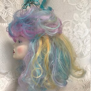 Teal, Lavender, Pink and Yellow Long Wavy Drag Show Wig with Sparkling Birdcage and Resident Bird. image 2