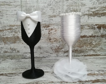 Decorated crystal cups. Personalized wedding Cups. Romantic wedding setting. Couple of glasses. Wedding decoration. Wedding present