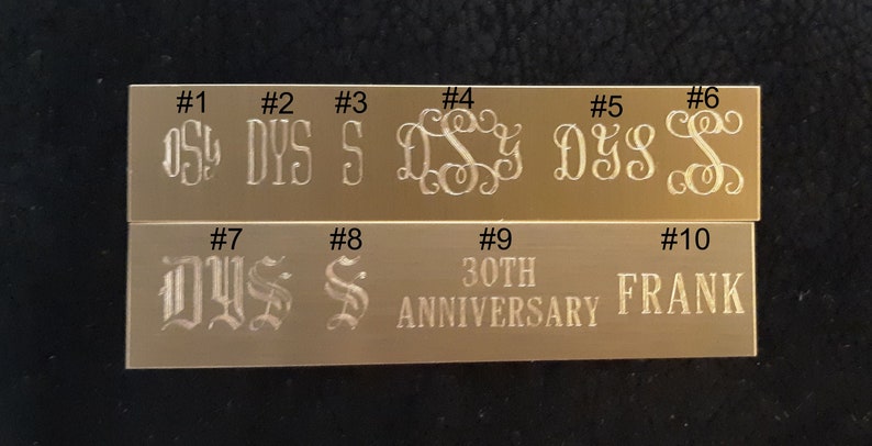May include: Ten different engraved metal plates with various designs and text. The plates are numbered 1 through 10. The text on the plates includes the letters "DYS", "S", "30TH ANNIVERSARY", and "FRANK".