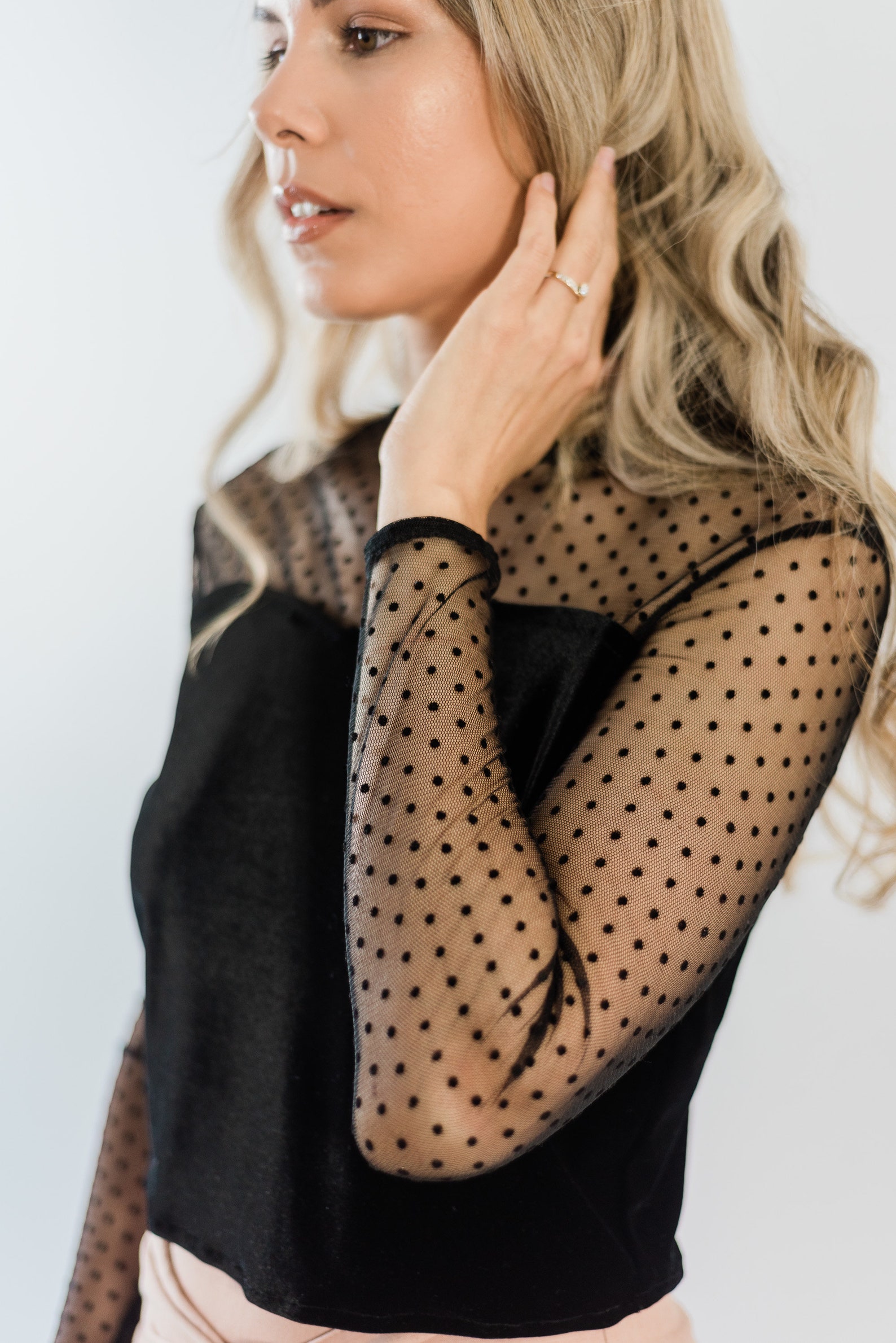 black top with mesh polka dot sleeves