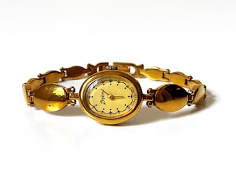 Goldene Vintage Uhr für Frauen. Vintage Damenuhr, Zierliche goldene Uhr, kleine Vintage Uhr, geblümte Damenarmbanduhr