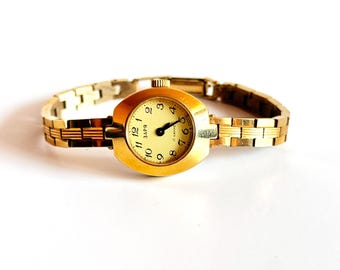Vintage Damenuhr, goldene Vintage Uhr. retro mechanische Uhren Zarja, zierliche goldene Uhr. Mechanische Vintage Uhr.