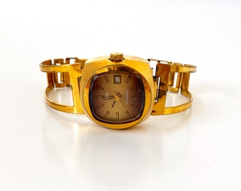 Bangle bracelet vintage watch. Gold vintage watch. Vintage watches for women. Women's golden watch. Christmas gift. Massive watch women