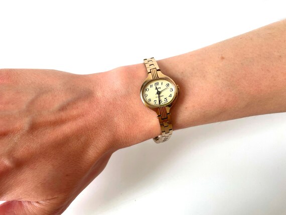 Dainty gold best sale watch