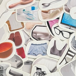 May include: A collection of various household items, including a toothbrush, toothpaste, a pair of slippers, a bra, underwear, a comb, a spoon, a roll of toilet paper, a pair of glasses, a computer monitor, a stack of books, a towel, and a wheelchair.