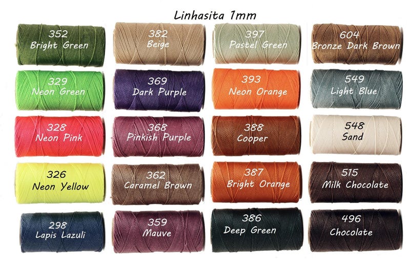 May include: A collection of colorful Linhasita 1mm waxed cord spools. Colors include bright green, neon pink, neon yellow, dark purple, bright orange, and chocolate. Each spool is labeled with a color name and number.