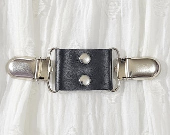Black leather midi cinch clip, dress clip, jacket clip, shirt clip, sweater clip, skirt clip, with silver tone clips. Instant DIY tailoring.