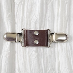 Brown leather midi cinch clip w/ silver tone clips. Dress clip, jacket clip, shirt clip, sweater clip, skirt clip, cloak clip. DIY tailor