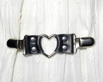 Black leather cinch clip with silver tone clips & heart shaped o-ring. Shirt clip, dress clip, sweater clip, skirt clip, jacket clip.
