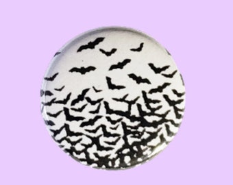 Bats, black, flying 1” diameter pin / button / badge / flair. Handmade.