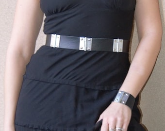 Black leather belt with silver tone hinges & rivets. Handmade. Shipping included.