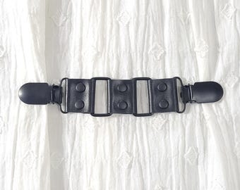 Black square rings, rivets, & clips w/ black leather. Shirt clip, dress clip, sweater clip, skirt clip, jacket clip, cloak clip. DIY tailor