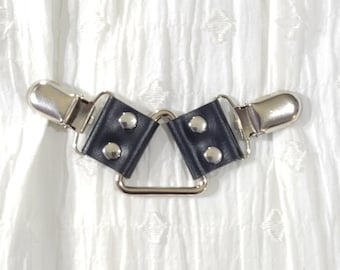 Silver tone triangle ring cinch clip w/ black leather. Shirt clip, dress clip, sweater clip, skirt clip, jacket clip, cloak clip. DIY tailor