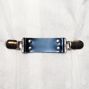 Blue leather cinch clip w/ silver tone clips. Dress clip, jacket clip, shirt clip, sweater clip, skirt clip, cloak clip. DIY tailoring.