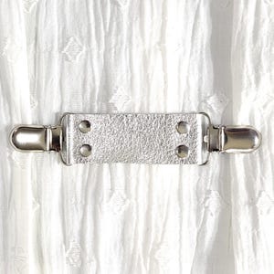 Silver metallic leather cinch clip, silver tone clips. Dress clip, jacket clip, shirt clip, sweater clip, skirt clip, cloak clip. DIY tailor