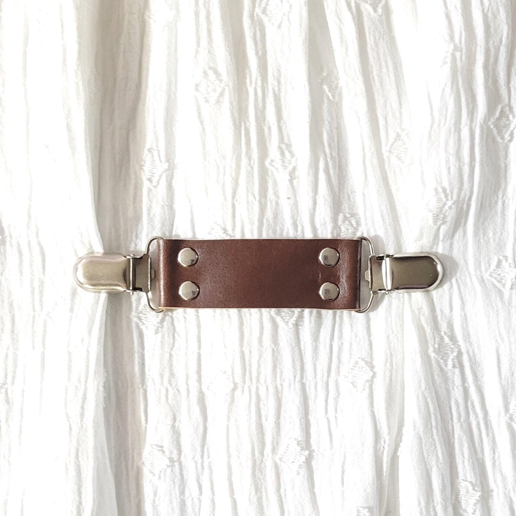 Brown leather cinch clip w/ silver tone clips. Dress clip, jacket clip, shirt clip, sweater clip, skirt clip, cloak clip. DIY tailoring