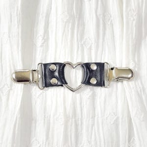 Silver tone heart ring cinch clip w/ black leather. Shirt clip, dress clip, sweater clip, skirt clip, jacket clip, cloak clip. DIY tailoring
