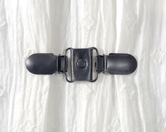 Black leather mini cinch clip w/ matte black clips. Dress clip, jacket clip, shirt clip, sweater clip, skirt clip, cloak clip. DIY tailoring
