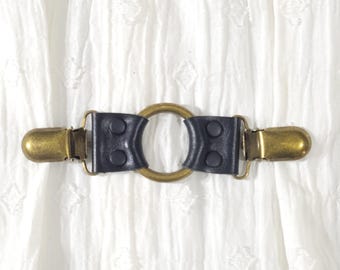 Black leather cinch clip w/ small bronze tone oring. Shirt clip, dress clip, sweater clip, skirt clip, jacket clip, cloak clip. DIY tailor.