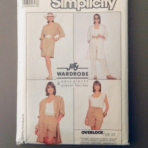 May include: Simplicity sewing pattern for a Jiffy Wardrobe, featuring four easy pieces. The pattern includes instructions for sewing on an Overlock/Serger machine. The package shows illustrations of a woman wearing various outfits.