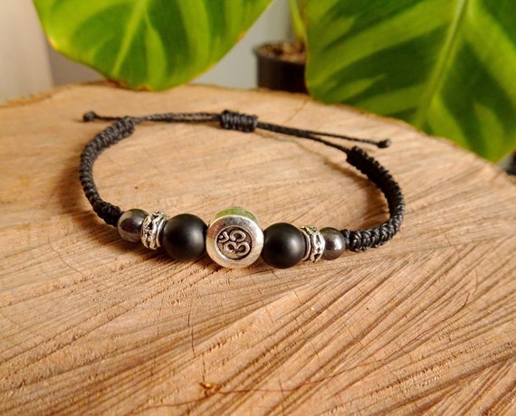 Black om bracelet deals