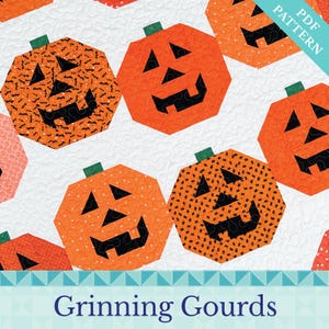 May include: A quilt pattern featuring orange jack-o'-lanterns with black facial features and green stems. Some pumpkins have bat-patterned fabric. The words "PDF PATTERN" and "Grinning Gourds" are also visible.