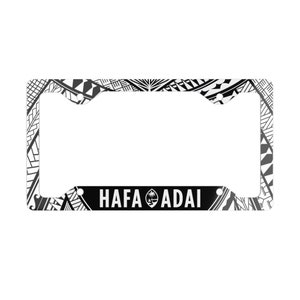 May include: A white metal licence plate frame with a black and white Polynesian design. The frame has a black band across the bottom with the text "HAFA ADAI" in white letters and a small image of the flag of Guam.