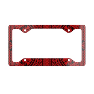 May include: Red and black license plate frame with a tribal pattern.