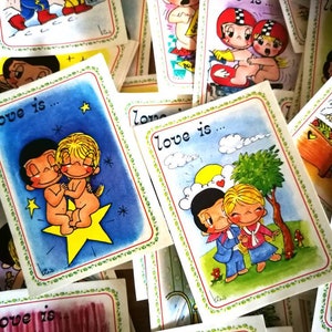 10 vintage stickers from 1975 Love is... van Kim Casali ca 7,5*5,5 cm / 3*2,2". Randomly chosen.