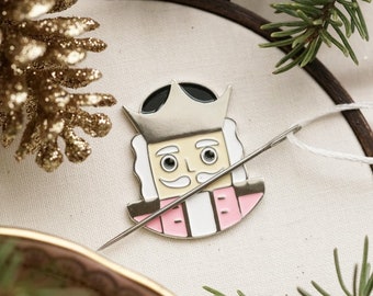 Needle Minder - Pink Sugar Plumb Nutcracker Needle Minder - Enamel Needle Minder