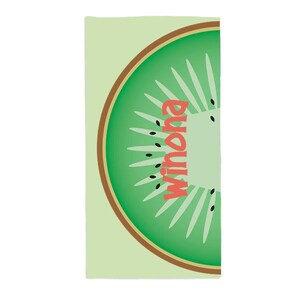 May include: A green and brown kiwi fruit with the word "Winona" written in red on it. The kiwi is on a light green background.