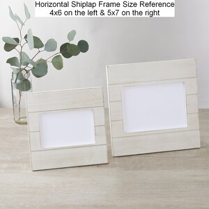 May include: Two whitewashed wood picture frames with a shiplap design. The frame on the left is 4x6 inches and the frame on the right is 5x7 inches.