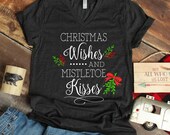 Christmas Wishes and Mistletoe Kisses - womens Christmas shirt - cute Christmas shirt - trending shirt - meet me under mistletoe shirt