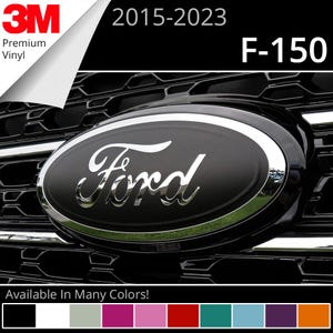 May include: A black Ford emblem with chrome lettering and a chrome border, mounted on a black vehicle grille. Text on the image includes 3M Premium Vinyl, 2015-2023, F-150, and Available In Many Colors, with a color palette bar at the bottom.