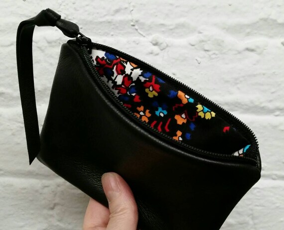small black zipper pouch