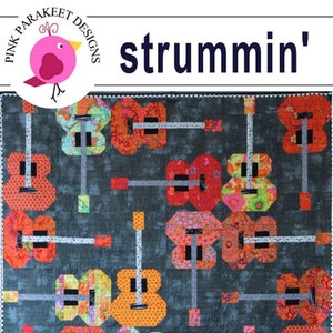 May include: A quilting pattern featuring a colorful guitar design with the text "strummin'" and "Fat Quarter Friendly".