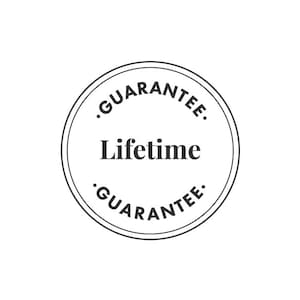 May include: Black and white circular stamp with the text "Lifetime Guarantee" in a bold font.
